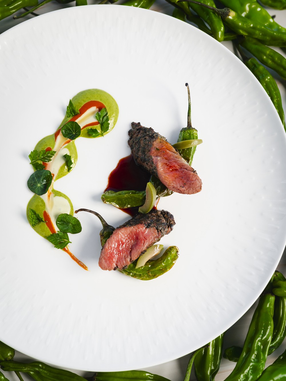 peace country lamb, blistered pepper, espelette puree, green olive espuma