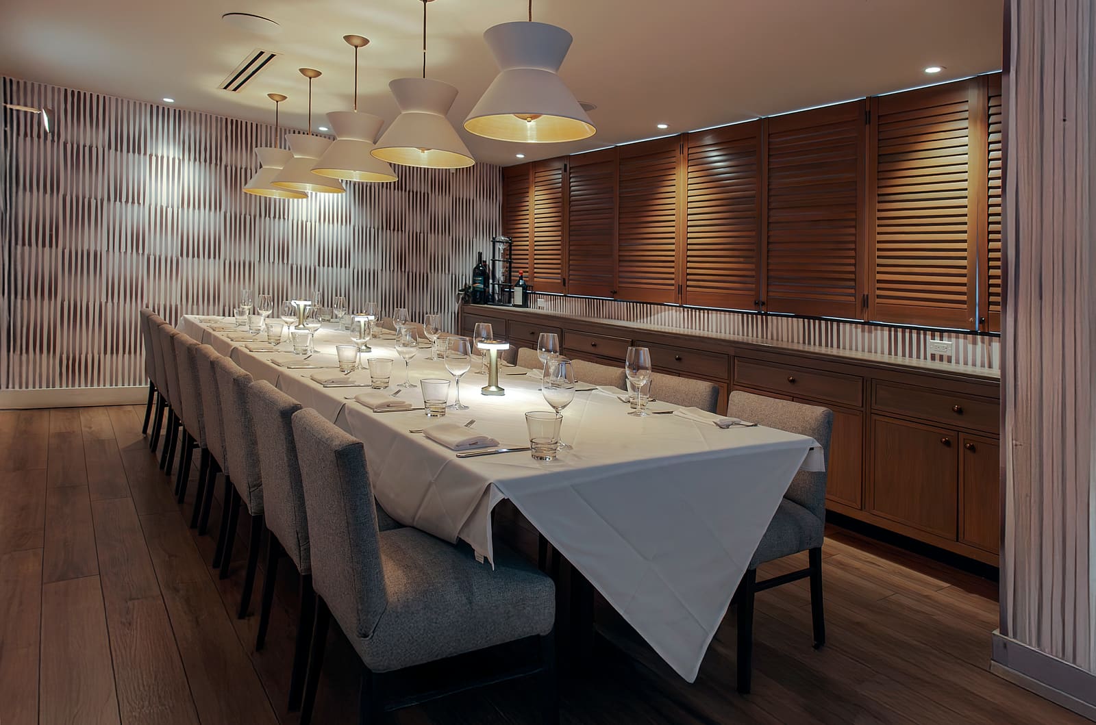 A private room set for a long-table dinner at Coast