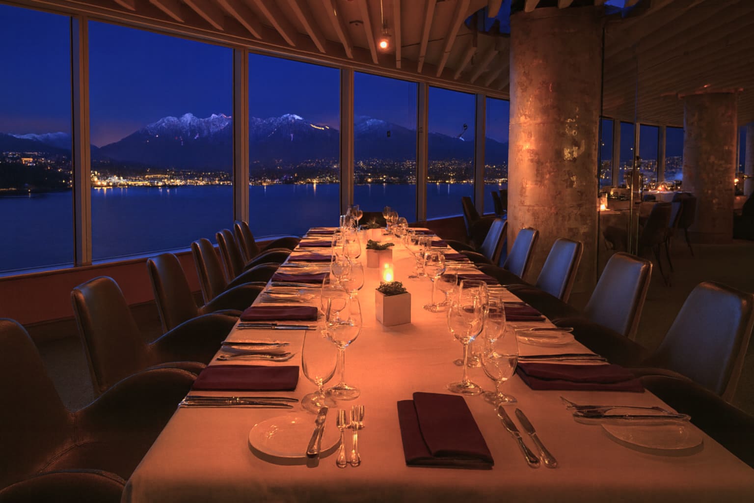 A candlelit private dinner at Five Sails, overlooking the harbour