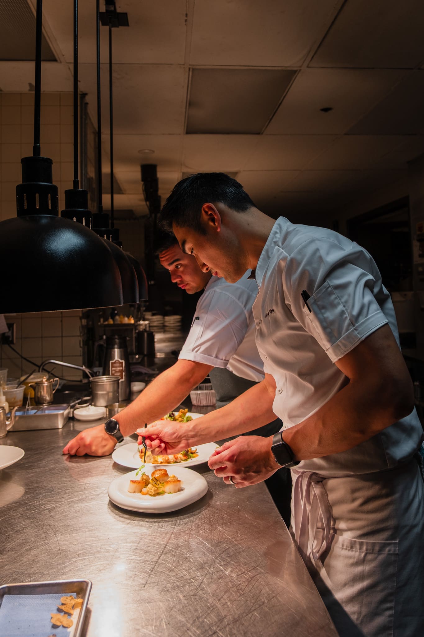 Chefs plating at Five Sails