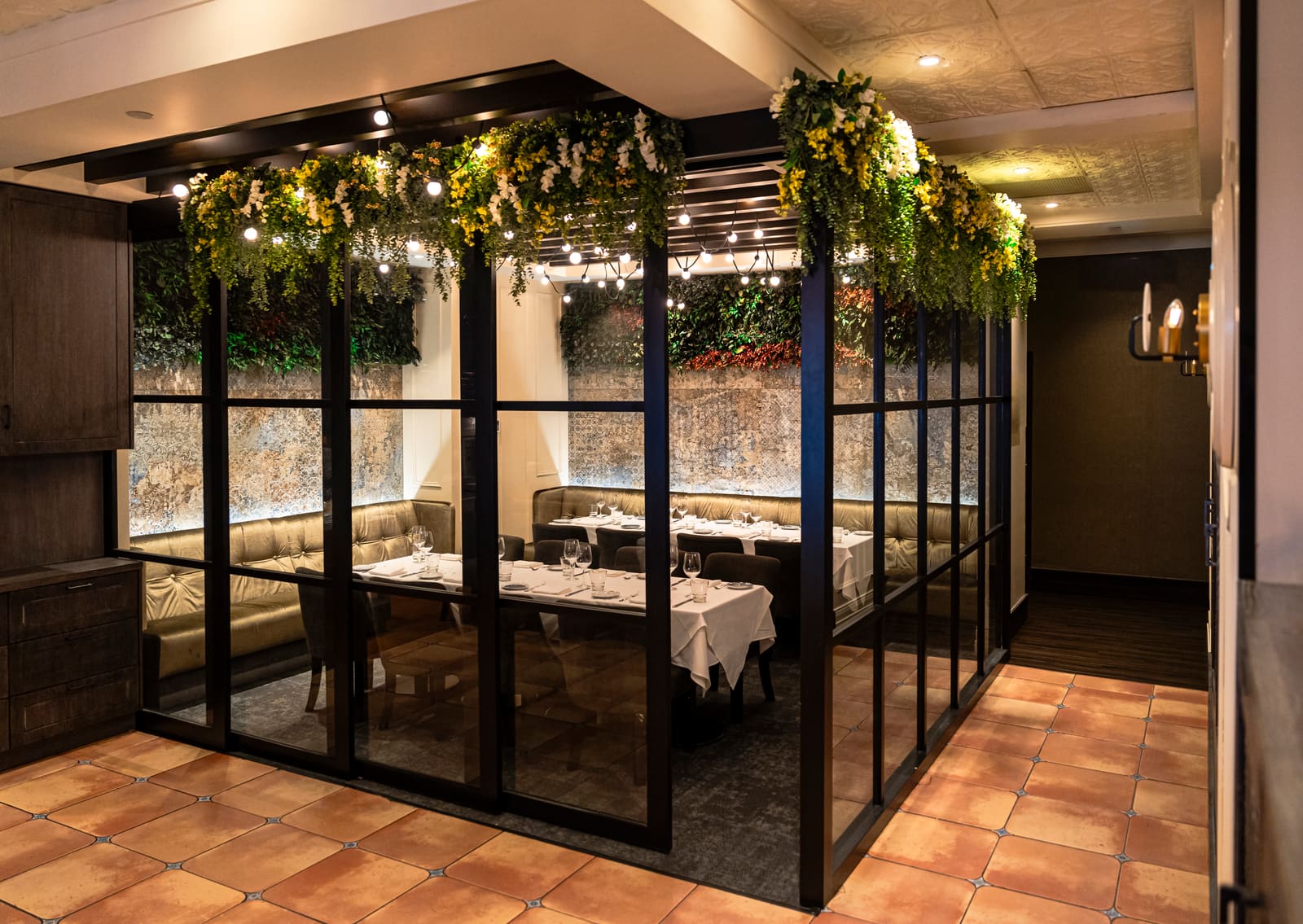 The glass-enclosed La Serra Room at Italian Kitchen